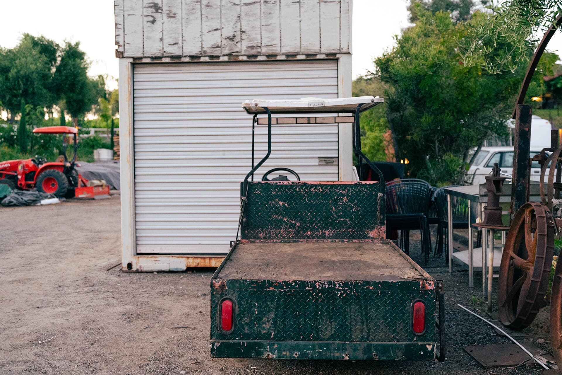Golf cart parked on a path